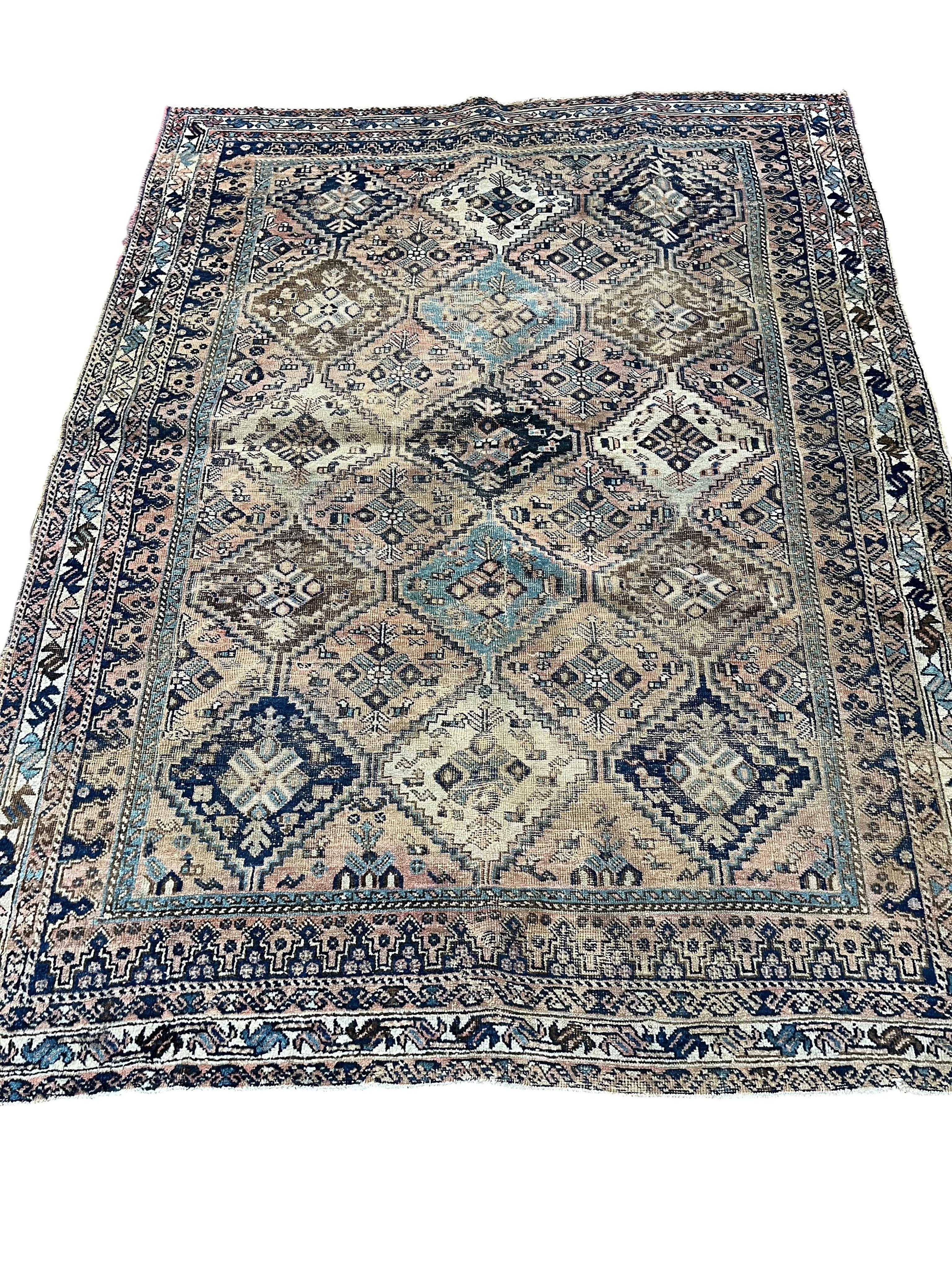 A Caucasian peach ground rug, 190 x 148cm